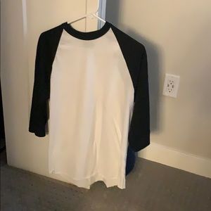 Black baseball tee and a green T-shirt